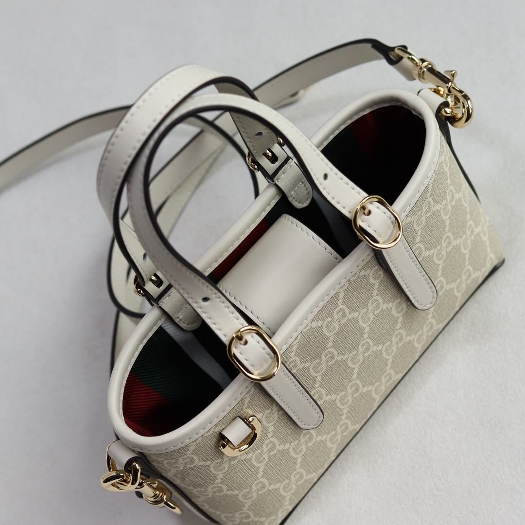 Gucci GG Emblem Handbag 855491 in Brown