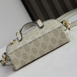 Gucci GG Emblem Handbag 855491 in Brown