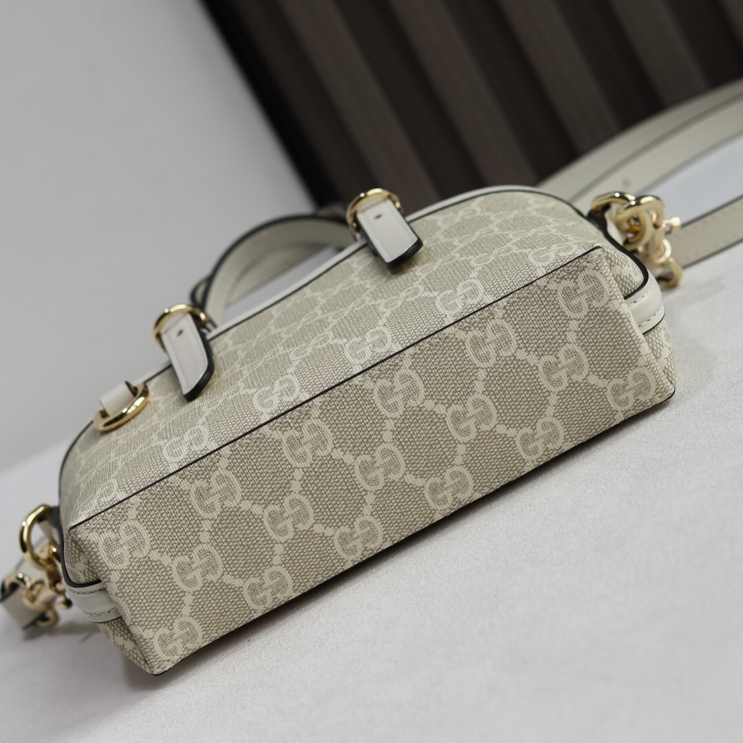 Gucci GG Emblem Handbag 855491 in Brown