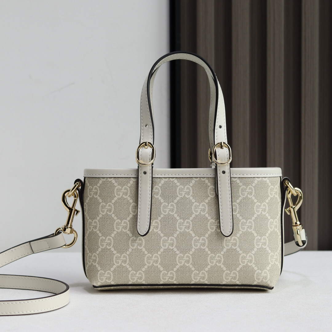 Gucci GG Emblem Handbag 855491 in Brown